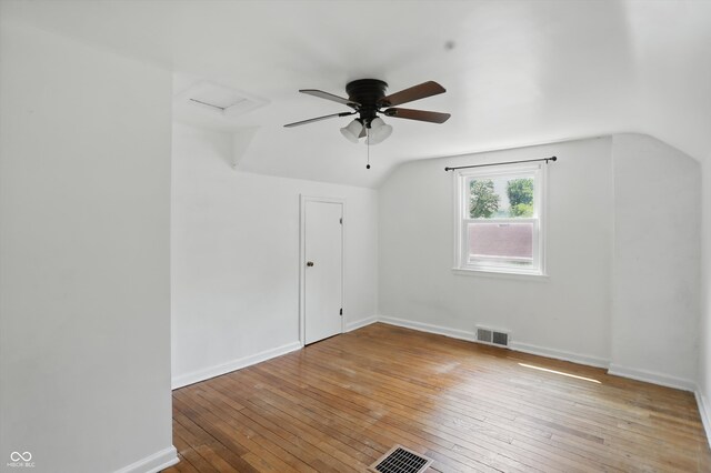 2905 N Warman Ave, Indianapolis, IN 46222 - additional living space featuring vaulted ceiling, attic access, hardwood / wood-style floors, baseboards, and a ceiling fan