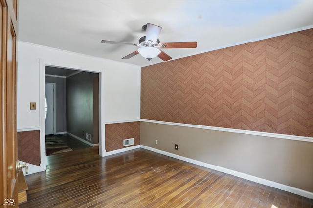 2905 N Warman Ave, Indianapolis, IN 46222 - unfurnished room featuring a ceiling fan, baseboards, and hardwood / wood-style floors
