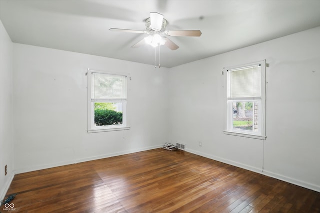 2905 N Warman Ave, Indianapolis, IN 46222 - empty room with hardwood / wood-style flooring, ceiling fan, and baseboards
