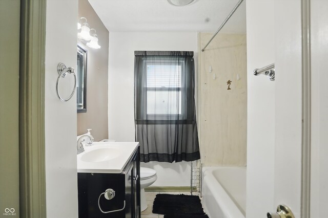 2905 N Warman Ave, Indianapolis, IN 46222 - bathroom featuring vanity, toilet, shower / bath combo, and tile patterned floors
