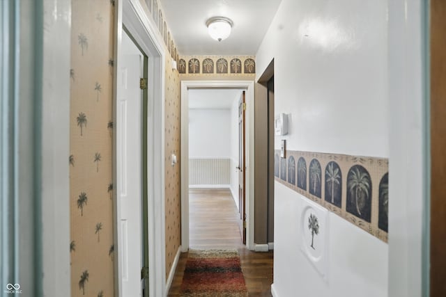 2905 N Warman Ave, Indianapolis, IN 46222 - corridor with dark wood-type flooring, wallpapered walls, and baseboards
