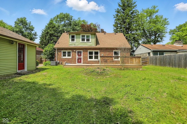 2905 N Warman Ave, Indianapolis, IN 46222 - rear view of property with brick siding, a deck, and central AC unit