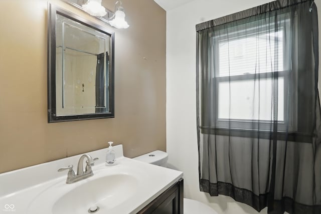 2905 N Warman Ave, Indianapolis, IN 46222 - bathroom featuring toilet, vanity, and a shower with shower curtain