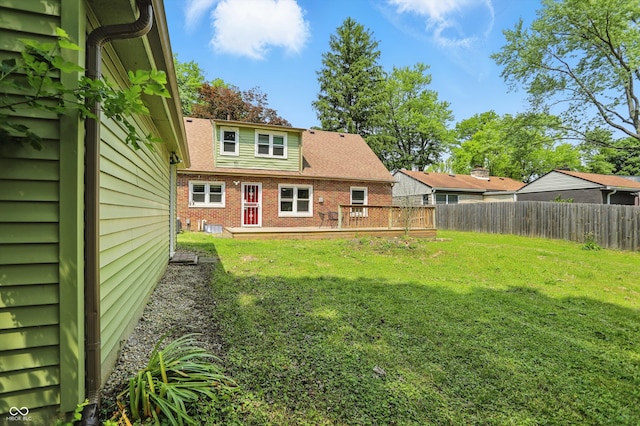 2905 N Warman Ave, Indianapolis, IN 46222 - back of property featuring brick siding and a wooden deck