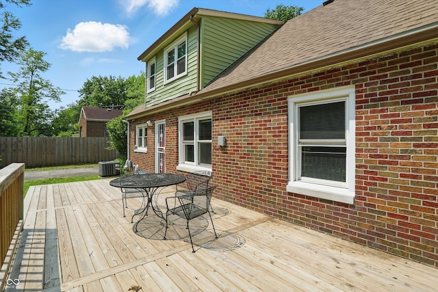 2905 N Warman Ave, Indianapolis, IN 46222 - wooden terrace with central AC and outdoor dining area