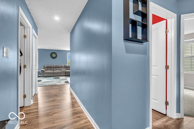 123 Campus Ln, Greenwood, IN 46143 - corridor featuring wood finished floors and baseboards