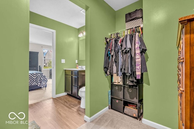 123 Campus Ln, Greenwood, IN 46143 - spacious closet featuring wood finished floors