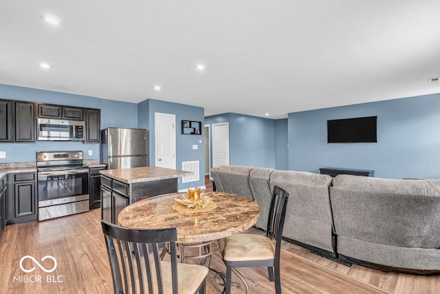 123 Campus Ln, Greenwood, IN 46143 - dining space featuring light wood-style floors and recessed lighting