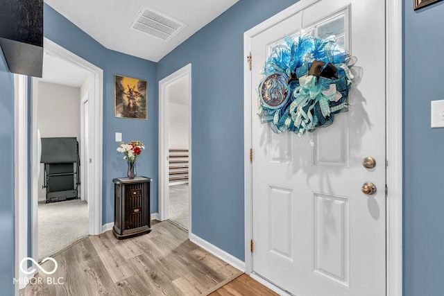 123 Campus Ln, Greenwood, IN 46143 - foyer entrance with wood finished floors and baseboards