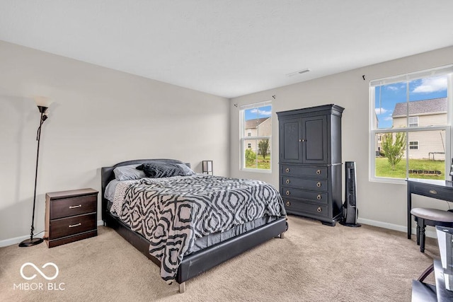 123 Campus Ln, Greenwood, IN 46143 - bedroom with light colored carpet and baseboards