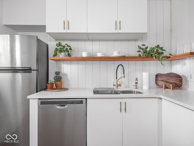 1617 E 52nd St, Indianapolis, IN 46205 - kitchen featuring open shelves, stainless steel appliances, white cabinets, and light countertops