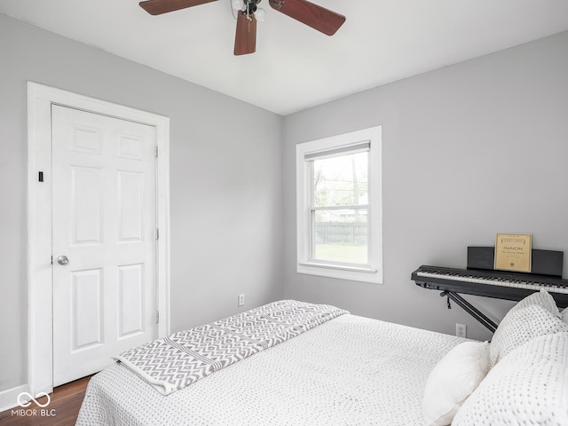 1617 E 52nd St, Indianapolis, IN 46205 - bedroom featuring dark wood finished floors and ceiling fan