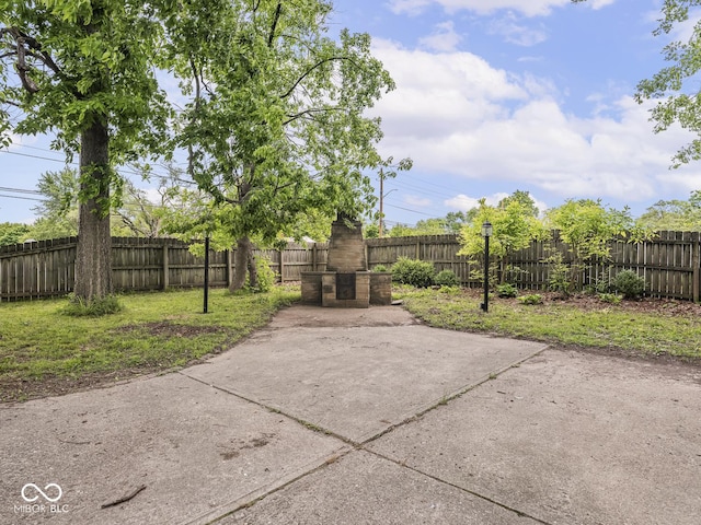 1617 E 52nd St, Indianapolis, IN 46205 - fenced backyard featuring a patio area
