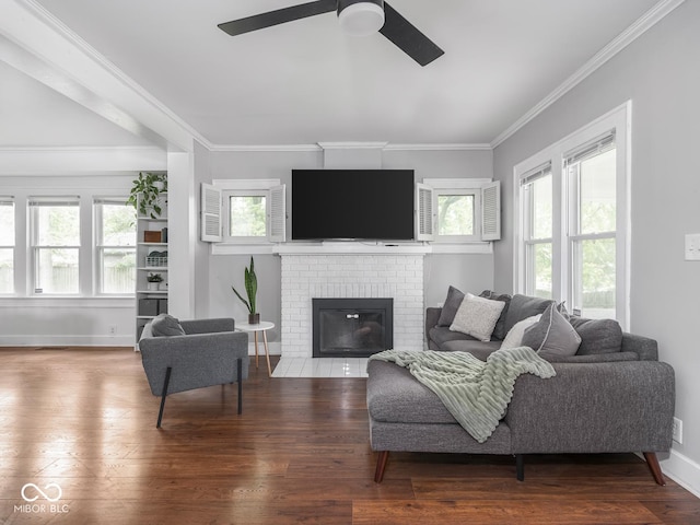 1617 E 52nd St, Indianapolis, IN 46205 - living area with a ceiling fan, plenty of natural light, wood finished floors, crown molding, and a fireplace