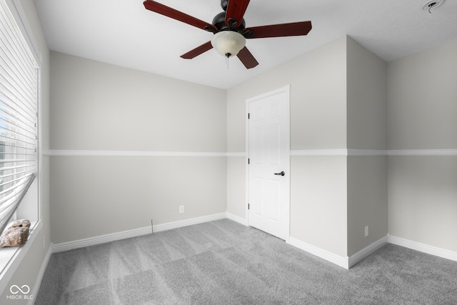 12383 S 25 W, Columbus, IN 47201 - carpeted spare room with a ceiling fan and baseboards