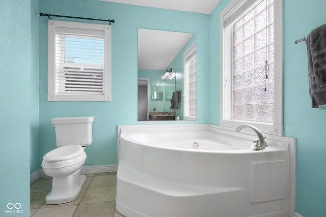 12383 S 25 W, Columbus, IN 47201 - full bath featuring a garden tub, baseboards, toilet, and tile patterned floors