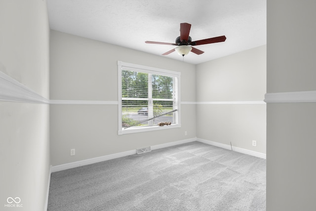 12383 S 25 W, Columbus, IN 47201 - spare room featuring ceiling fan, baseboards, and carpet flooring