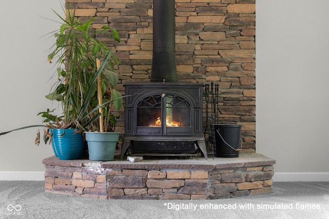 12383 S 25 W, Columbus, IN 47201 - detailed view of a wood stove, baseboards, and carpet flooring