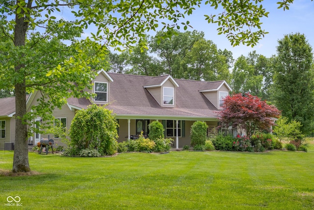 12383 S 25 W, Columbus, IN 47201 - cape cod home featuring a front yard and covered porch
