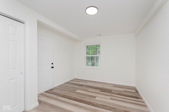 233 N Devon Ave, Indianapolis, IN 46219 - unfurnished room with light wood-type flooring and baseboards