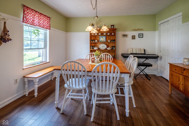 1052 Barley Cir, Carmel, IN 46032 - dining room with a chandelier, dark wood-type flooring, and baseboards