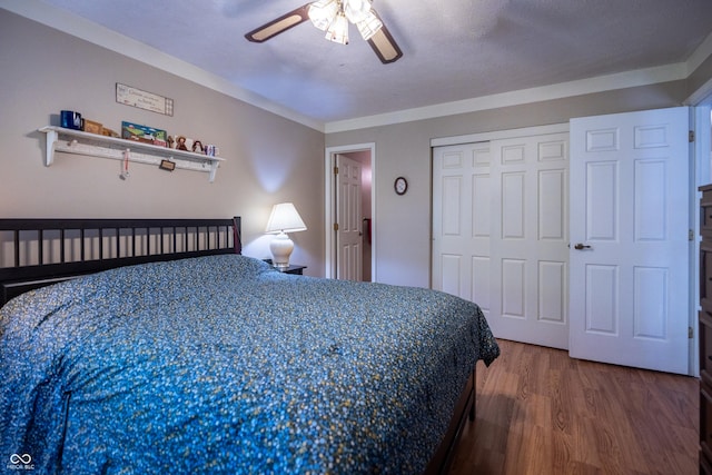 1052 Barley Cir, Carmel, IN 46032 - bedroom with wood finished floors, a closet, and ceiling fan