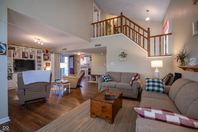 1052 Barley Cir, Carmel, IN 46032 - living room with wood finished floors, a towering ceiling, and stairs