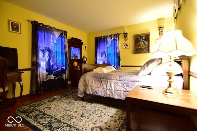 6412 Fall Creek Rd, Indianapolis, IN 46220 - bedroom with wood finished floors and baseboards