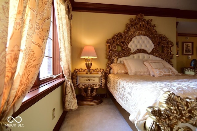6412 Fall Creek Rd, Indianapolis, IN 46220 - carpeted bedroom with ornamental molding