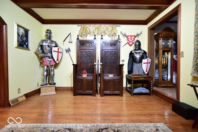 6412 Fall Creek Rd, Indianapolis, IN 46220 - foyer entrance with wood finished floors, ornamental molding, arched walkways, baseboards, and beamed ceiling