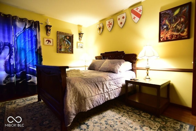 6412 Fall Creek Rd, Indianapolis, IN 46220 - bedroom featuring wood finished floors