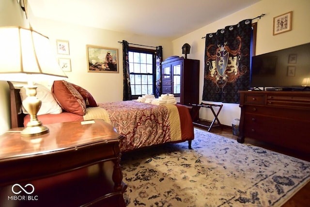 6412 Fall Creek Rd, Indianapolis, IN 46220 - bedroom with wood finished floors
