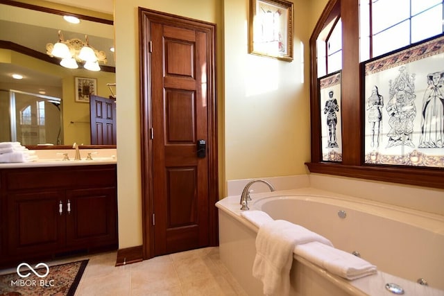 6412 Fall Creek Rd, Indianapolis, IN 46220 - full bathroom featuring vanity, a tub with jets, tile patterned flooring, a shower stall, and a chandelier