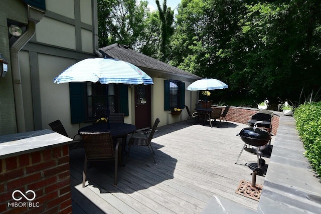 6412 Fall Creek Rd, Indianapolis, IN 46220 - deck featuring outdoor dining space and area for grilling