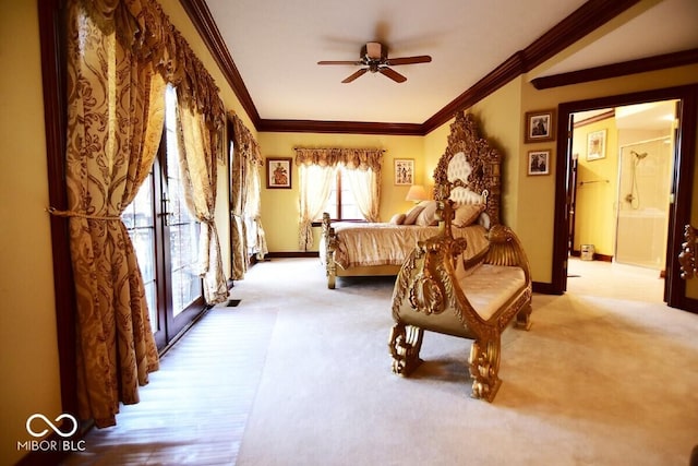 6412 Fall Creek Rd, Indianapolis, IN 46220 - carpeted bedroom with baseboards, crown molding, and ensuite bath