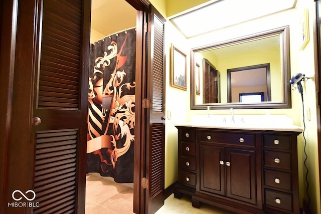 6412 Fall Creek Rd, Indianapolis, IN 46220 - bathroom featuring vanity and tile patterned floors