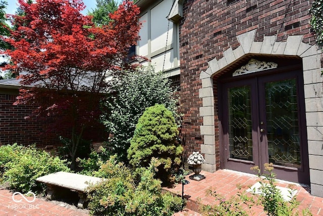 6412 Fall Creek Rd, Indianapolis, IN 46220 - property entrance with french doors and brick siding