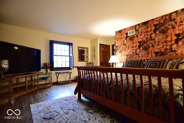 6412 Fall Creek Rd, Indianapolis, IN 46220 - bedroom with wood finished floors and baseboards