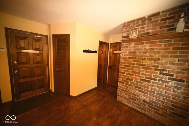 6412 Fall Creek Rd, Indianapolis, IN 46220 - hall featuring dark wood-type flooring and baseboards