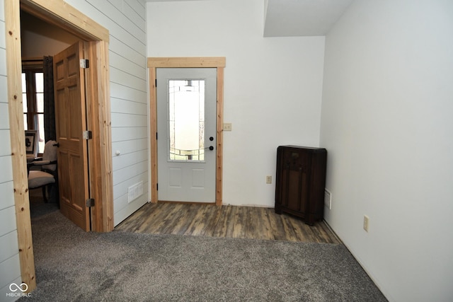 2780 W Grizzly Trl, Martinsville, IN 46151 - entryway featuring wooden walls, carpet flooring, and wood finished floors