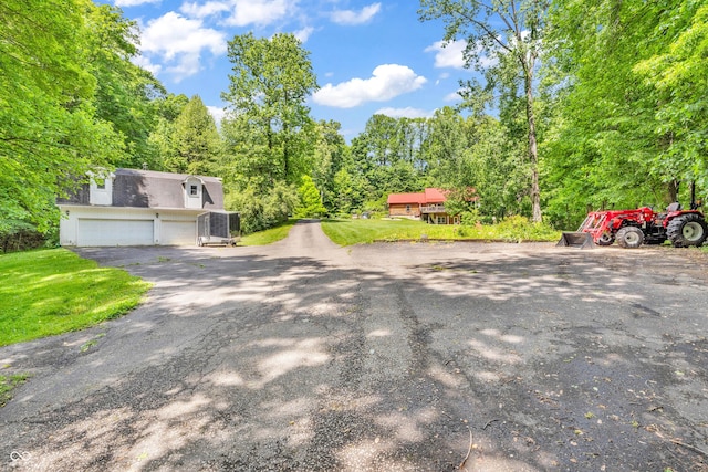 2780 W Grizzly Trl, Martinsville, IN 46151 - view of front facade with driveway, a front lawn, and a garage