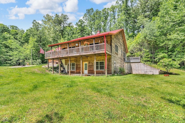 2780 W Grizzly Trl, Martinsville, IN 46151 - back of property featuring a lawn, a deck, a view of trees, and a chimney