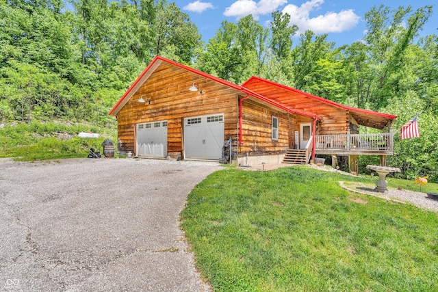 2780 W Grizzly Trl, Martinsville, IN 46151 - log home with an attached garage, driveway, and a front lawn