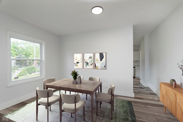 2531 E Brookside Ave, Indianapolis, IN 46218 - dining space featuring wood finished floors and baseboards