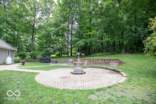 495 Persimmon Dr, North Vernon, IN 47265 - view of grassy yard with a patio area