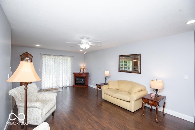 495 Persimmon Dr, North Vernon, IN 47265 - living area with recessed lighting, baseboards, a ceiling fan, dark wood finished floors, and a glass covered fireplace