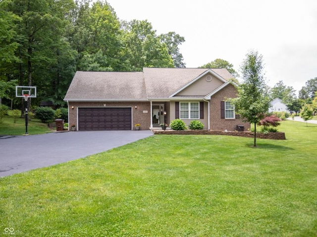 495 Persimmon Dr, North Vernon, IN 47265 - single story home featuring driveway, a garage, a front yard, and brick siding
