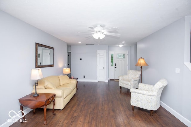 495 Persimmon Dr, North Vernon, IN 47265 - living room with dark wood finished floors, baseboards, and ceiling fan
