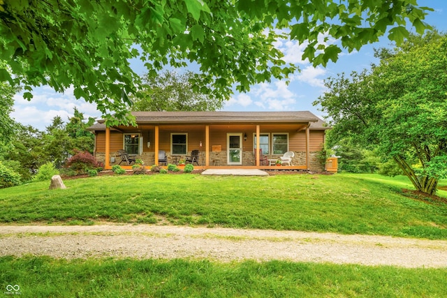 5730 S 50 W, Trafalgar, IN 46181 - single story home with covered porch, stone siding, and a front lawn