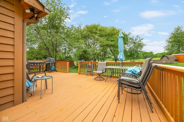 5730 S 50 W, Trafalgar, IN 46181 - deck featuring grilling area and view of wooded area